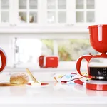 Macchinetta del caffè rossa