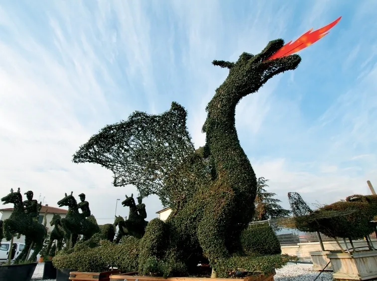 Statua drago pianta