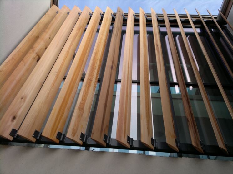 Frangisole legno lamelle mobili